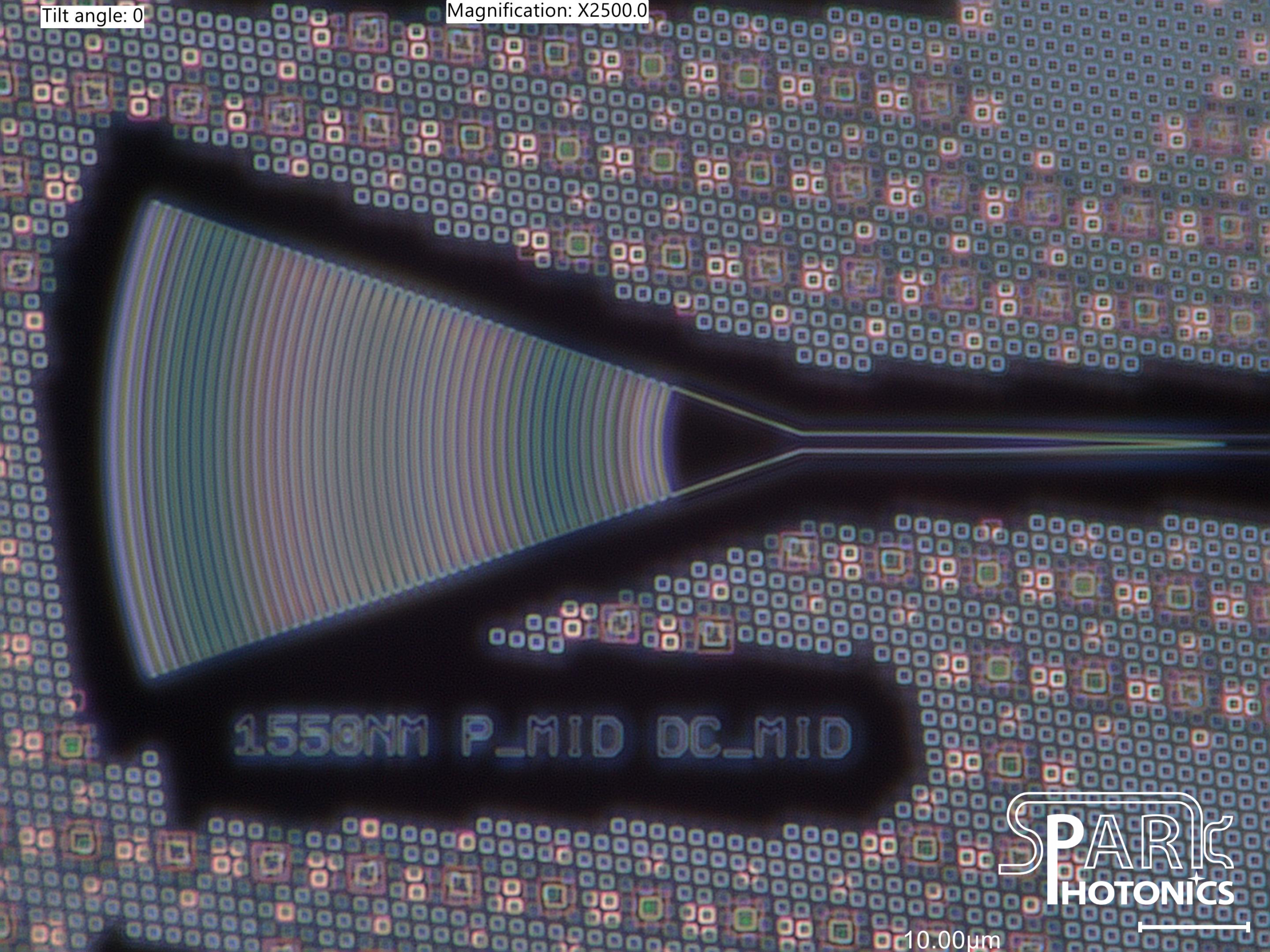 Close-up of a fabricated photonic integrated circuit wafer structure by Spark Photonics